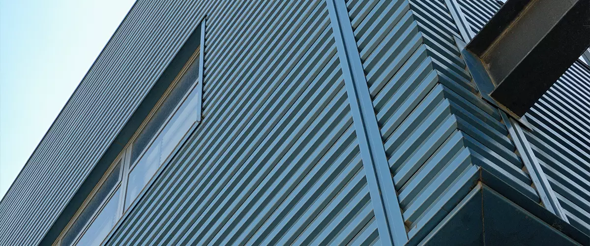 Blue metal exterior metal siding of a building