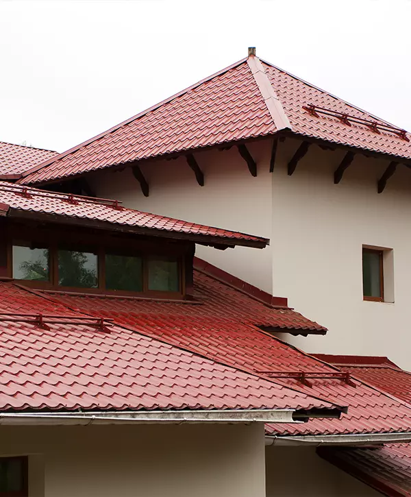 Mansard Roof of the house, red roofing